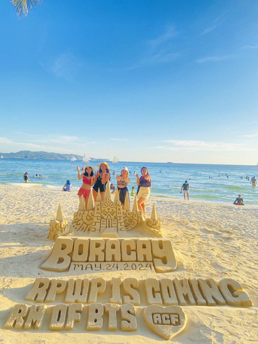 army_cavite's tweet photo. Yesterday (May 4), Head Admin Bie suggested some ideas to Mommy Jess (also an ACF Admin) on how we can promote #RightPlaceWrongPersonByRM effectively.

The ideas were: Sand Castle promo and Admin Bie promoting while parasailing, both of which we successfully executed.

Sandcastle art can be expensive because we pay for the detailed effort and talent, and if we wanted something that would last for days, it would cost more. So, we opted for something that could be built and then erased after a few hours. Our RPWP sandcastle promotion lasted around 4 hours, but thankfully, a lot of foreigners and locals saw it. This promotion wouldn't have been successful without the help of our fellow ARMY who reside here in Boracay. We thank our BPST member, Jobylee, for finding us a talented sandcastle artist. It was nice to finally meet you!