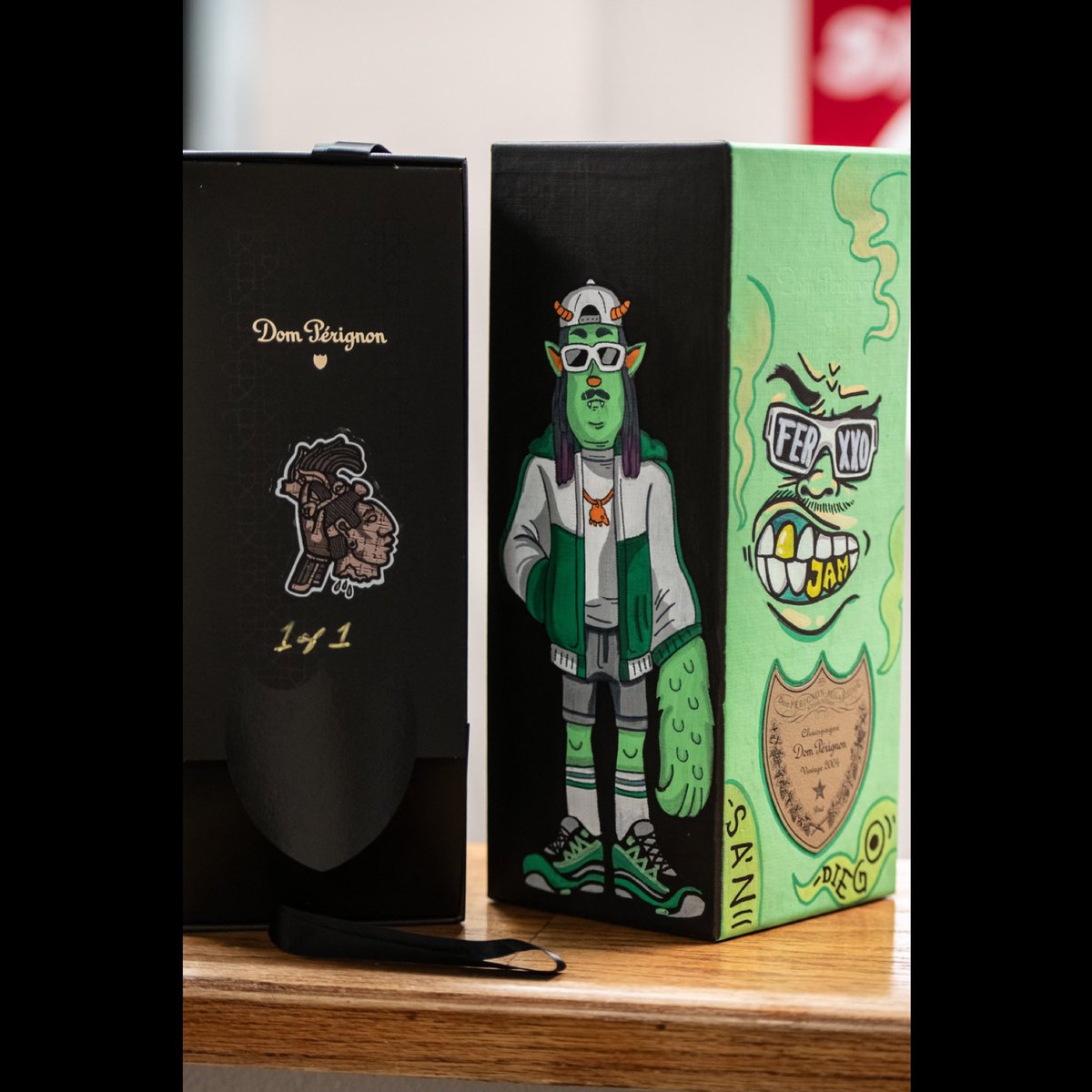 PechangaArenaSD's tweet photo. A special FERXXOCALIPSIS Tour inspired custom Dom Perignon bottle made by @PakoPablos for Colombian artist @itsfeid! 💚🍾 

📷 @ShotLivePhoto https://t.co/Hpbf7oiTm3