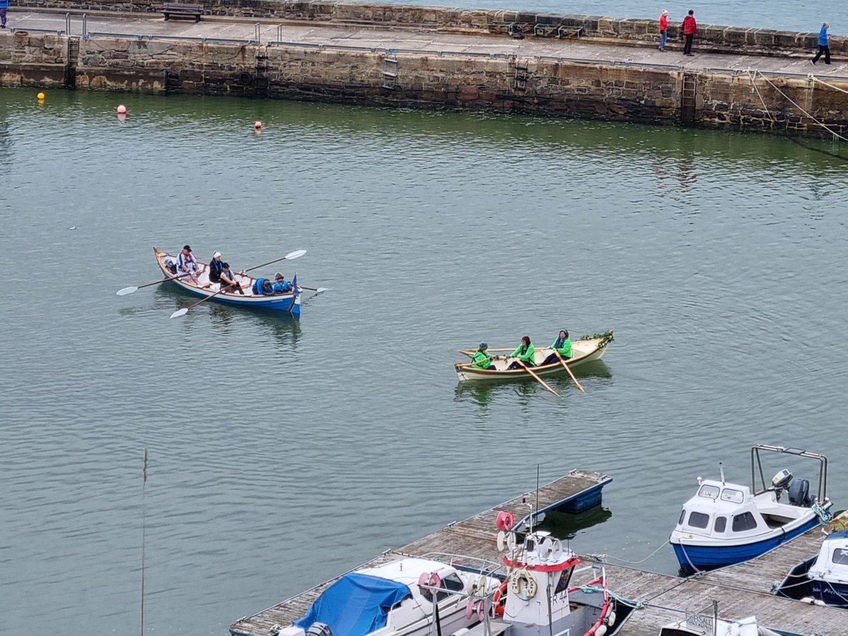 A truly stunning view of the St Ayles and Wemyss skiffs taking part in the 2024 Six Harbour Row.