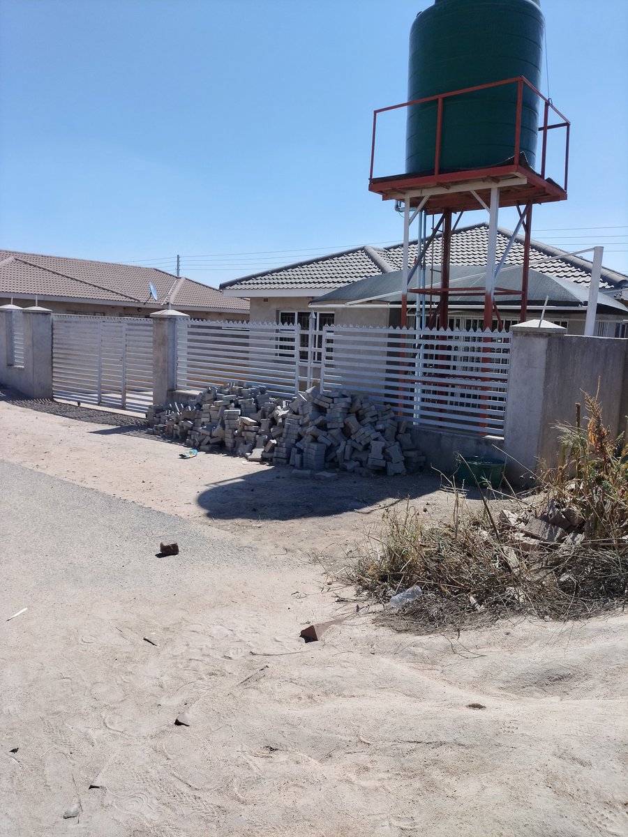 Please be advised 

There is no point of putting a palisade or Clearview fence on your boundary wall for a residential House. Its nice for commercial properties.

The purpose of a boundary wall as follows;
1. Security 
2. Privacy
3. Demarcating the extent of the property

Learn