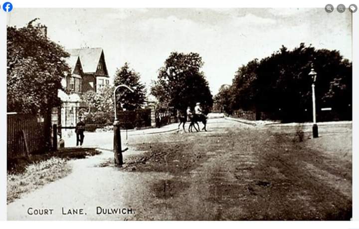An old postcard of Court Lane, Dulwich, courtesy of the 'I grew up in Southeast London' Facebook group. The original poster was curious about the object on the left, the bent over post. @DulwichHistory