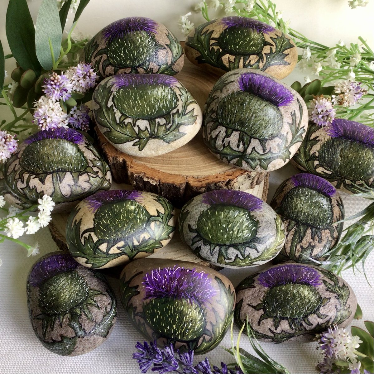 elbricrafts's tweet photo. Morning #ukgiftam, these hand painted thistle pebbles are one of my best sellers and get sent all over the world to remind people how beautiful our Flower of Scotland is! #thistles #scotland #giftideas https://t.co/iJ2OXCHn13 https://t.co/CGGqWX8SYj