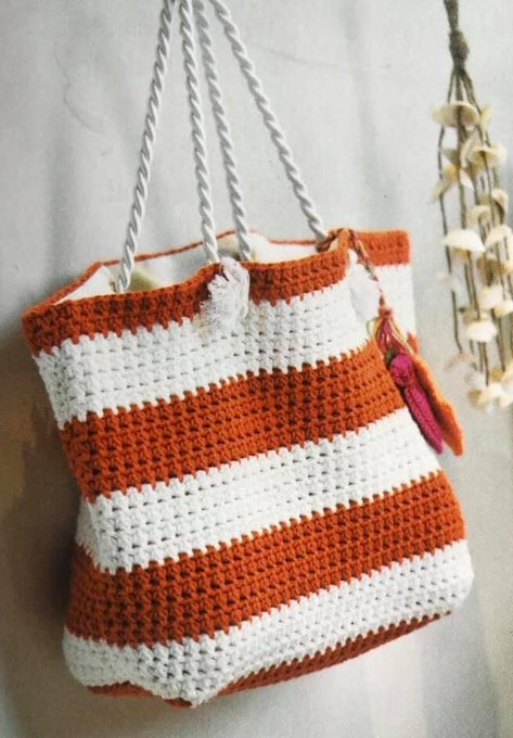 Beautiful Bright Crochet Striped Beach Bag 🧡🤍 

Perfect for those sunny days outings. Finished with thick cord handles, vibrant stripes, and adding playful little fish motifs. Create your own stylish summer accessory #MHHSBD #craftbizparty #smartsocial #UKGiftAM #shopindie
