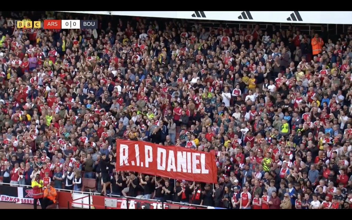 ‘14 minutes into the game at the Emirates and applause around the ground in memory of Daniel Anjorin, big Arsenal fan, who sadly lost his life in Hainault earlier this week’ remarks @BBC #MotD #ARSBOU match commentator “Lost his life”?! Murdered with a sword, tell it like it is.