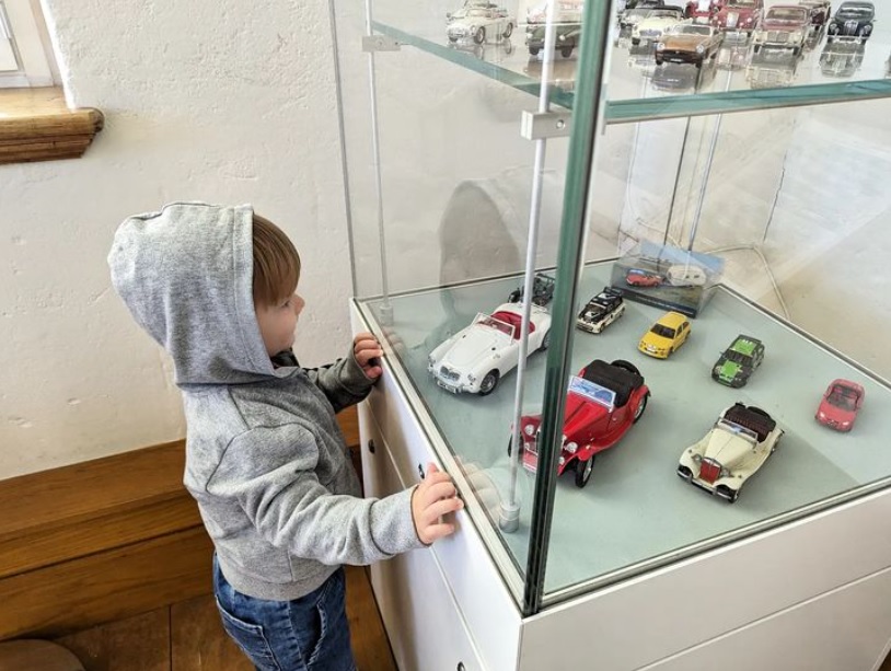 One of our youngest visitors today had such a good time exploring all the #MG model cars displayed as part of the #MG100 exhibition. @AbingdonMuseum is open today and tomorrow, #bankholidaymonday, from 10am to 4pm. FREE Admission. #Abingdon #kidsinmuseums #bankholidayweekend