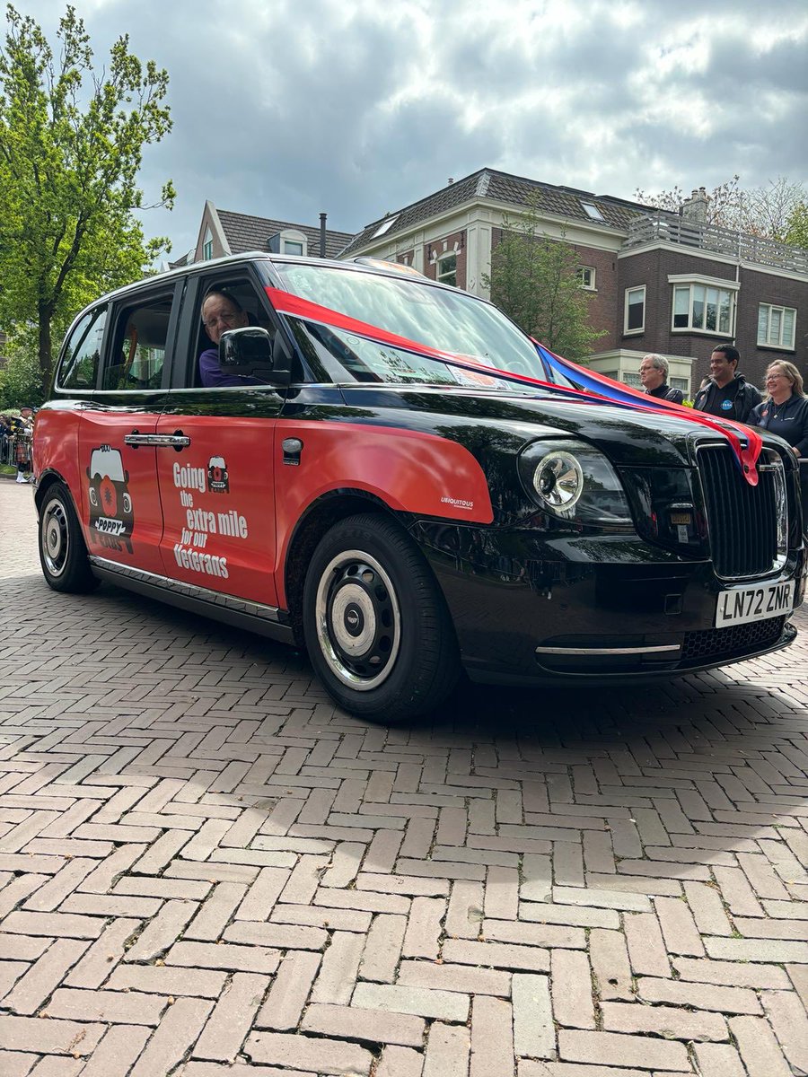 ⁦@PoppyCabs⁩ taxi near the front of the parade At Wageningen Liberation Day parade. The Dutch people really love our veterans.