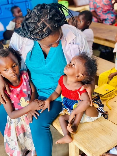 ThreeStrandsOrg's tweet image. Meet Dr. Rebecca in the #CentralAfricanRepublic She was one of our first &quot;Young Scholars,&quot; whom #ThreeStrands sent to school to get medical training. She now serves as our pediatrician and works with our #malnutrition program, bringing smiles and warmth everywhere she goes!