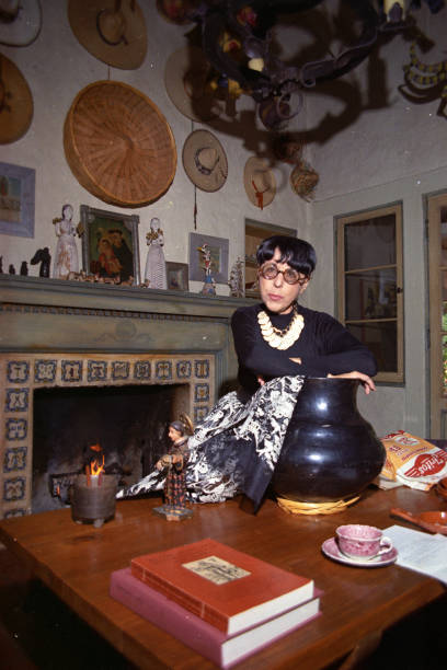 Legendary costume designer Edith Head in the kitchen of her Palm Springs home (year ?)