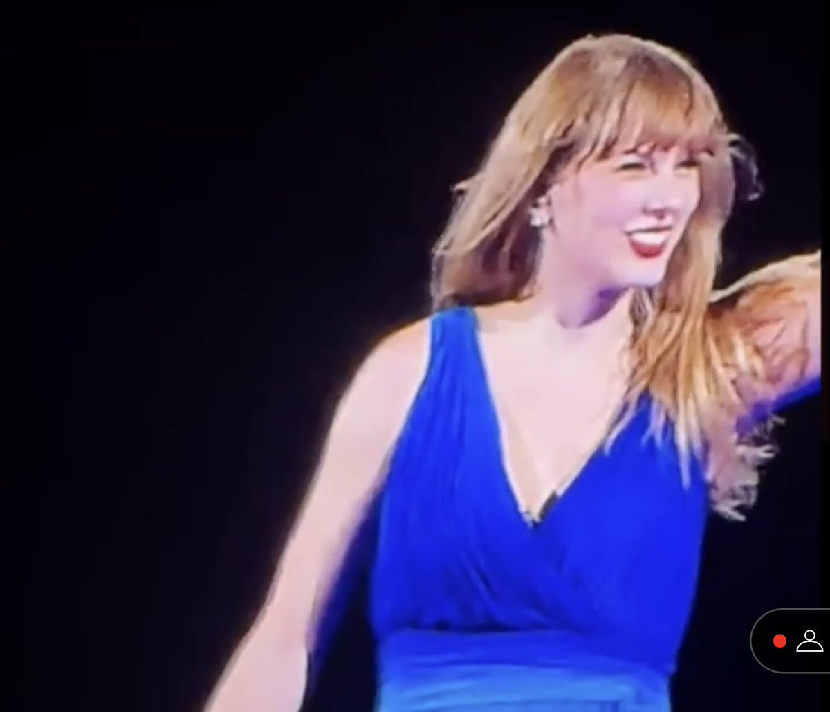 taylors huge smile after playing a sad song should tell you everything you need to know
