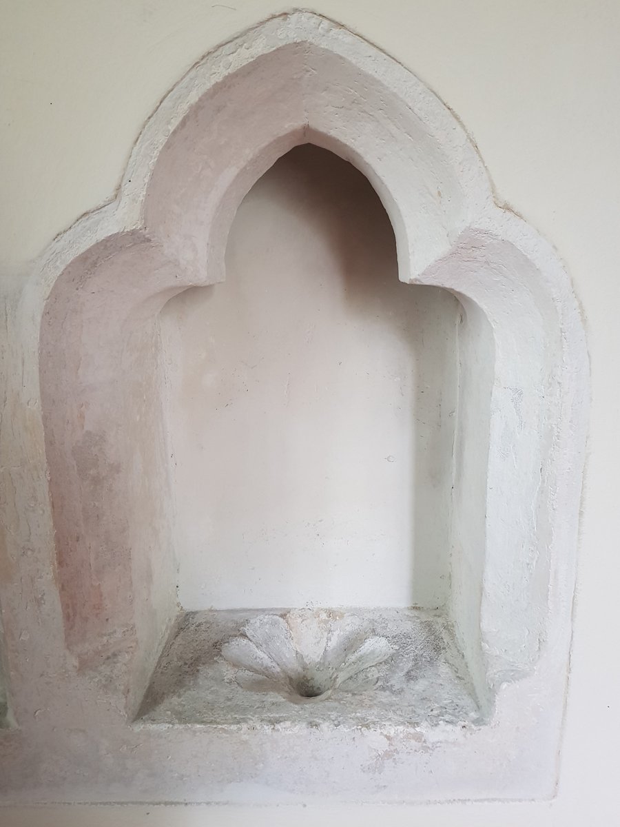 Piscina. South wall chancel #StPeterWimbourne. C13. Very nicely carved from one piece of stone. Pointed trefoil. Cavetto moulded. #StoneworkSunday #SundayStonework