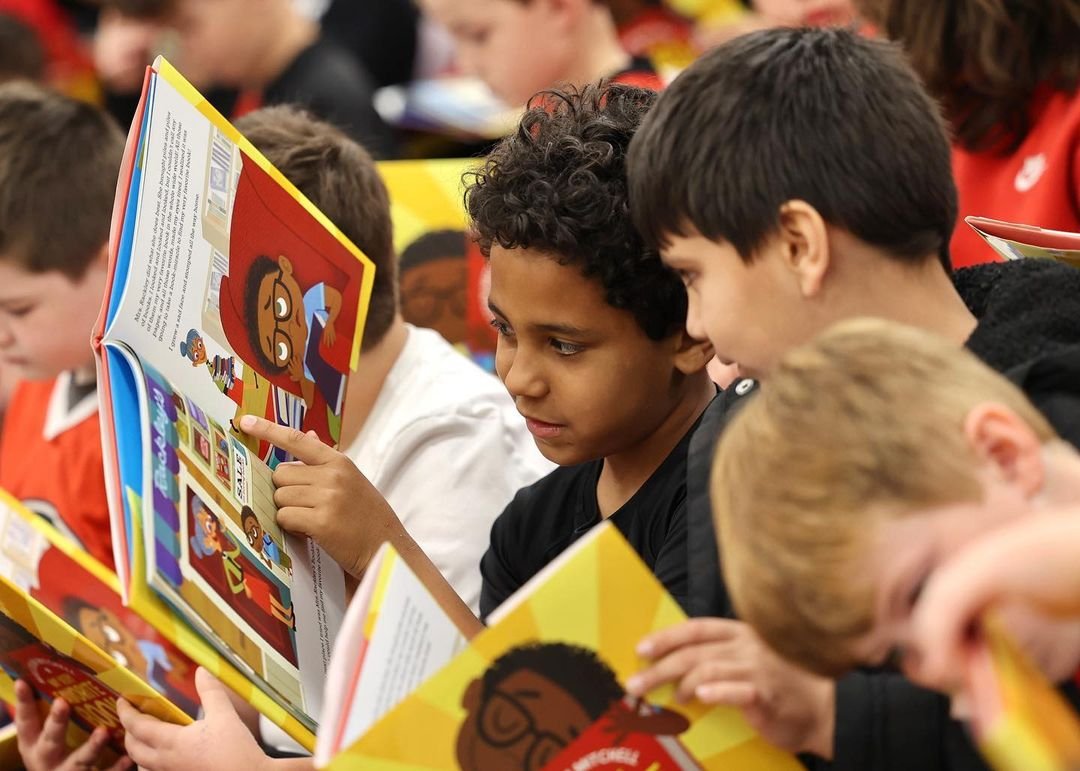 ReadWithMalcolm's tweet photo. Spotted – two kiddos finding their love of reading. 🤩 Do you remember the first time you ACTUALLY enjoyed a book? 
-
#ReadwithMalcolm #MalcolmMitchell #ReadtoSucceed #ReadingIsCool #ReadToSucceed #ReadMoreBooks https://t.co/wZ3rqWZMoq
