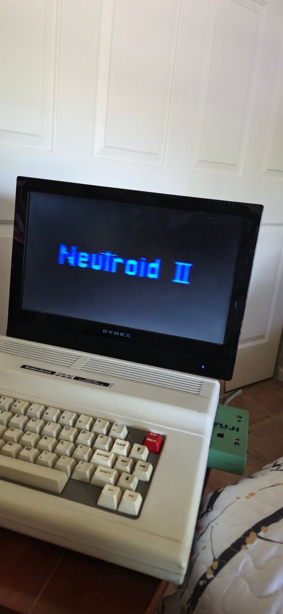 Rondelvo's tweet photo. From Down Under and brought to you by A Radio Shack CoCo 2 and FujiNet!!!...Sporting a CoCo3 Keyboard by Rick Ulland @ https://t.co/5CYGcn2S0e #thecoconation #coco2 https://t.co/5faxWet79M