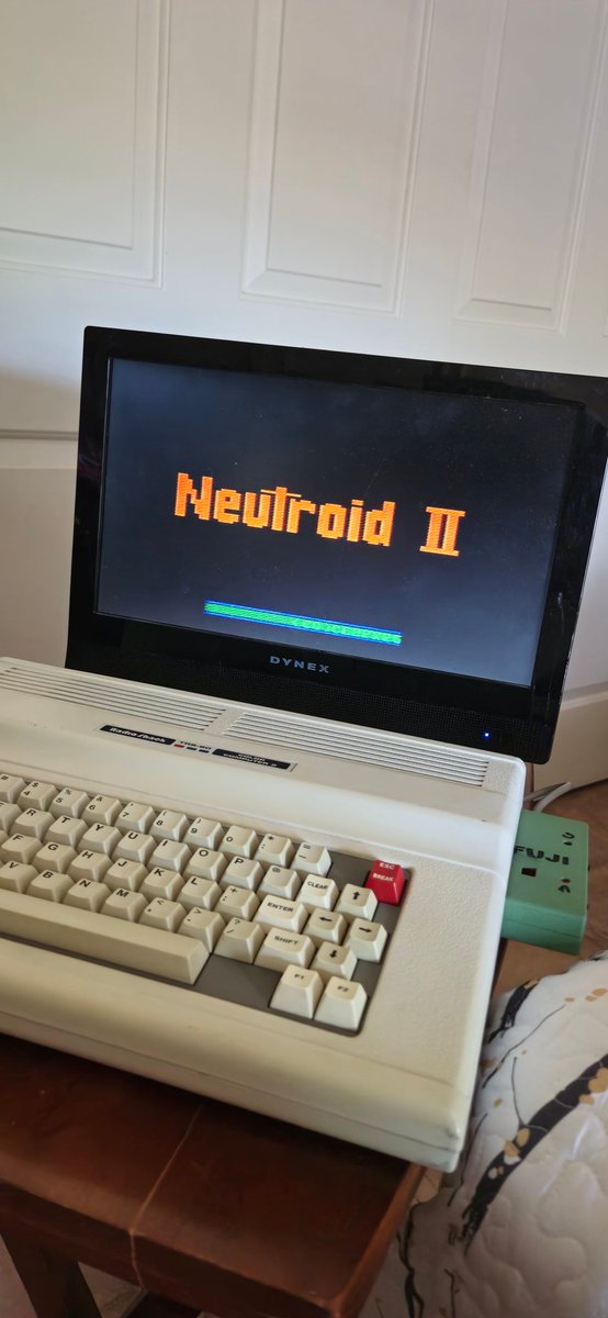 Rondelvo's tweet photo. From Down Under and brought to you by A Radio Shack CoCo 2 and FujiNet!!!...Sporting a CoCo3 Keyboard by Rick Ulland @ https://t.co/5CYGcn2S0e #thecoconation #coco2 https://t.co/5faxWet79M