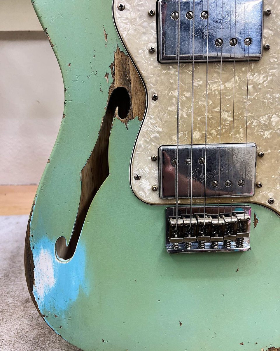 We're taking it back to the '70's with a '72 Aged Daphne Blue Tele — built by Levi Perry — featuring a pearl pickguard and CuNife pickups.