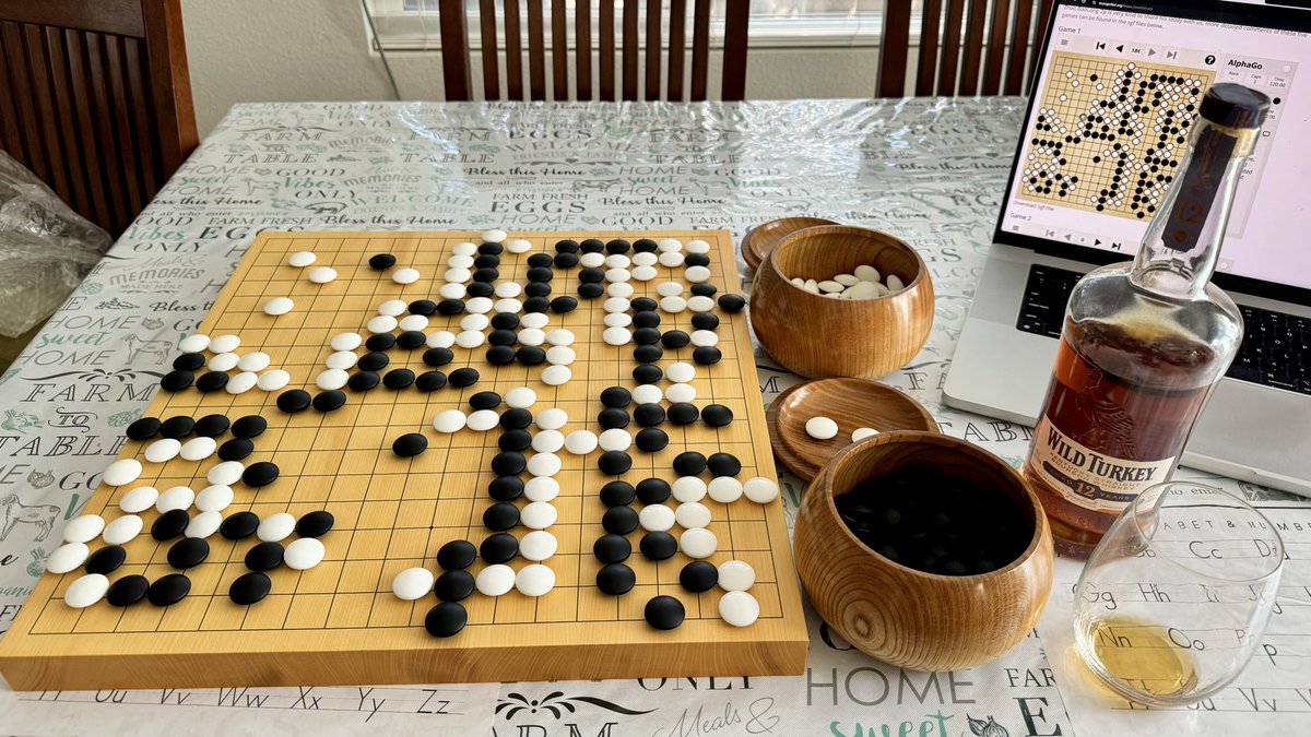 Took time to enjoy my favourite things I brought back from Japan:

- Hon Kaya go board
- Beautiful go bowls + stones
- Wild Turkey 12 

Having played go for over a decade, happy to finally replay the AlphaGo + Lee Sedol games