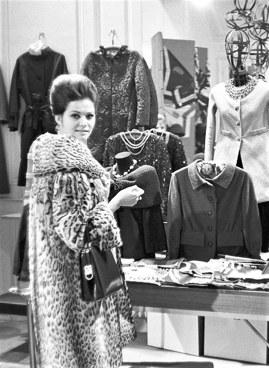 Claudia Cardinale shopping at the atelier of Yves Saint Laurent