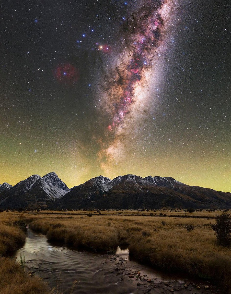 The Milky Way rises above the Southern Alps in New Zealand by Max Inwood.✨