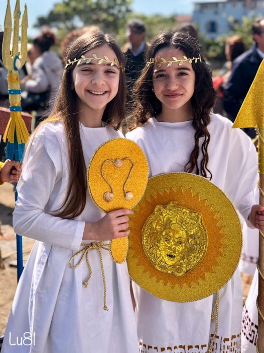 In Naxos, Sicily, every year children dress up in ancient Greek clothes and some of them represent the gods of Olympus. All this is done to consolidate and perpetuate their Greekness. Naxos in Sicily is a Greek colony founded in 734 BC.