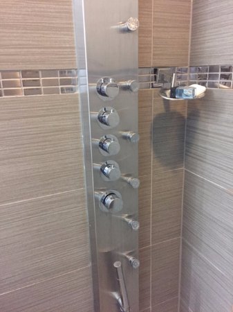 SOS I'm at a friend's house and idk how to turn on this shower

HELP