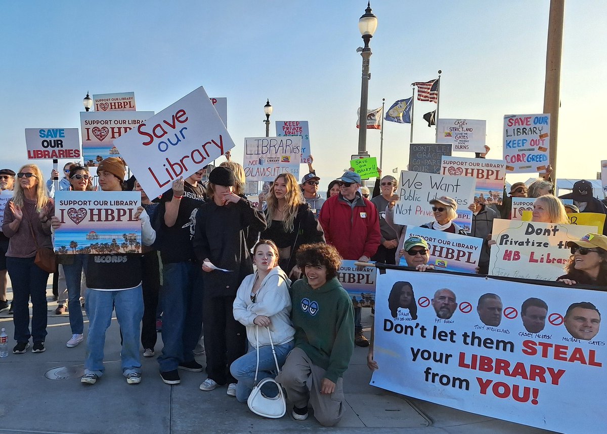 Over 200 people of all ages marched tonight down Main Street to protest library privatization and book banning. We received international press coverage—German magazine, GEO.