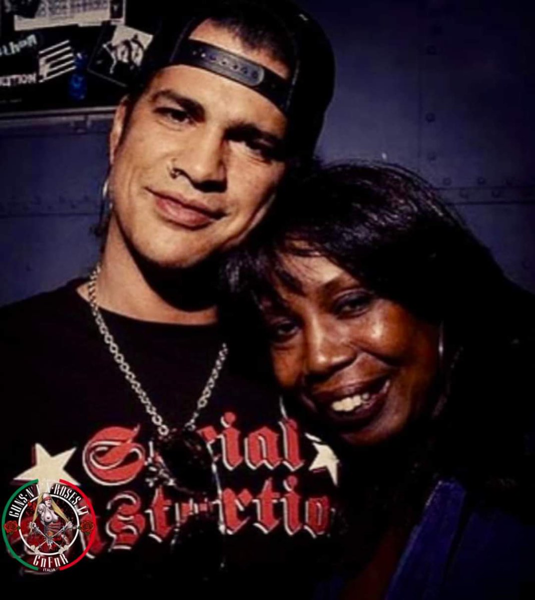 Slash of Guns N roses & his mother. let see how many negatives comments by white trolls. their fan base fixing to take that [L] lmfao..