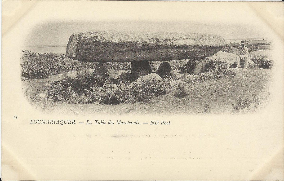 One of the earliest cards of the passage tomb of La Table des Marchands in Locmariaquer (Morbihan) is this one by Neurdein which was in print by 1897. It shows the main capstone and the decorated terminal slab (left) and a man sits on one of the capstones of the passage.