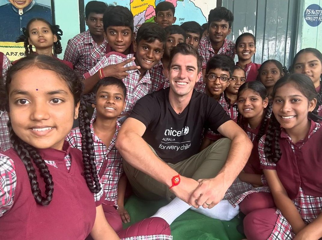 Pat Cummins with school kids at Hyderabad. ⭐