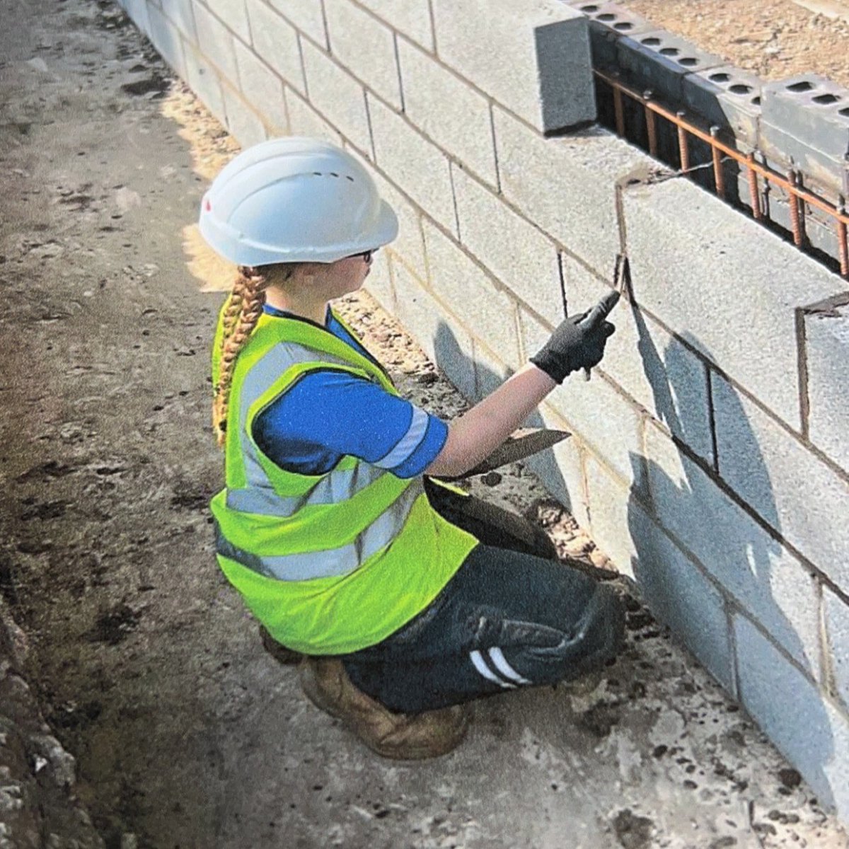 Gabriella Mitchell is loving her work experience with @WynneConstruct at the new Yale site: 'Work experience is amazing, I've loved every second. It's boosted my confidence and commitment to Bricklaying at Coleg Cambria.' Shoutout to Wynne Construction!