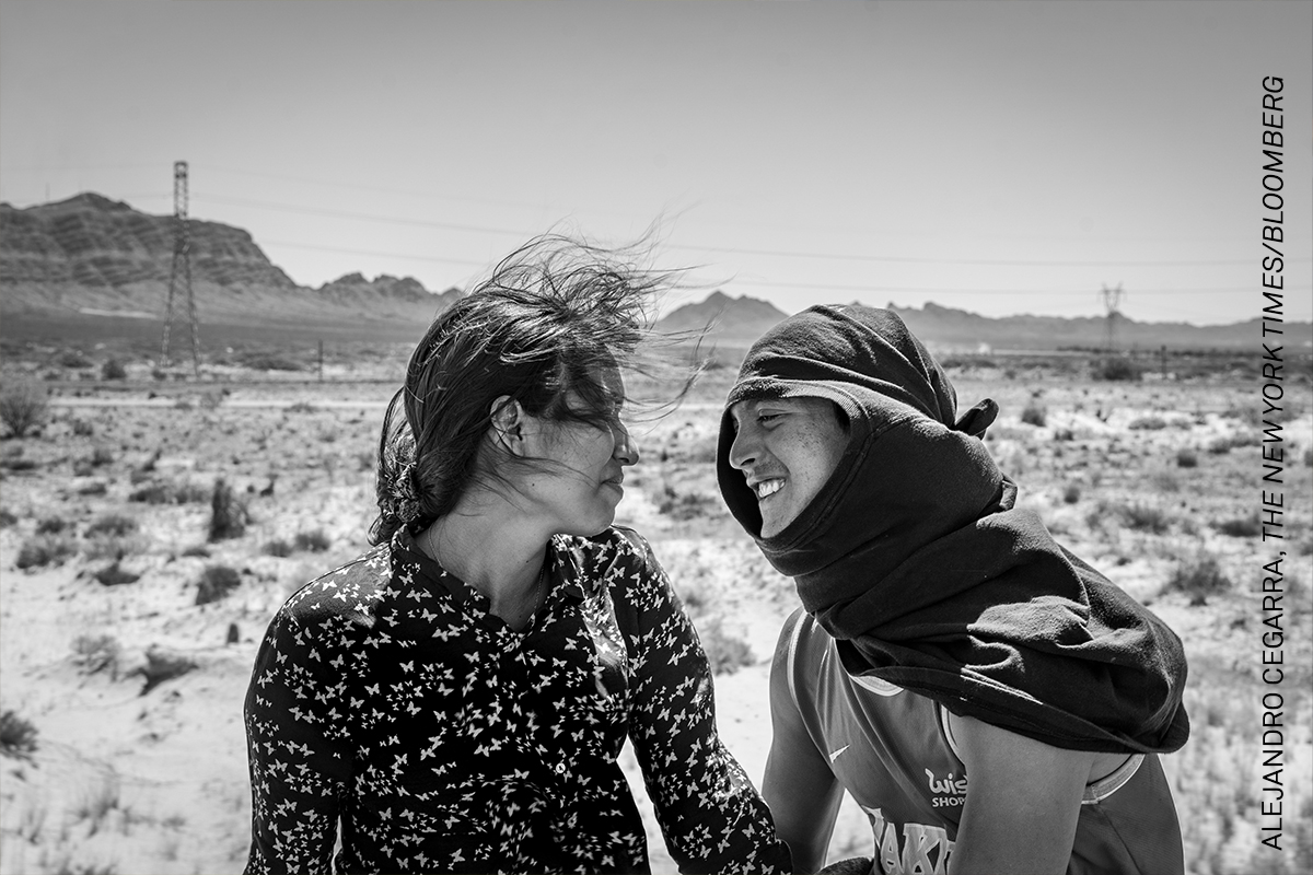 Photo of the Day | Ruben Soto, a migrant from Venezuela, sits with Rosa Bello, a Honduran migrant, atop a freight train known as “The Beast.” They met in Mexico and fell in love on their way to the US. From ‘The Two Walls’ by Alejandro Cegarra: bit.ly/3ww89pi #WPPh2024