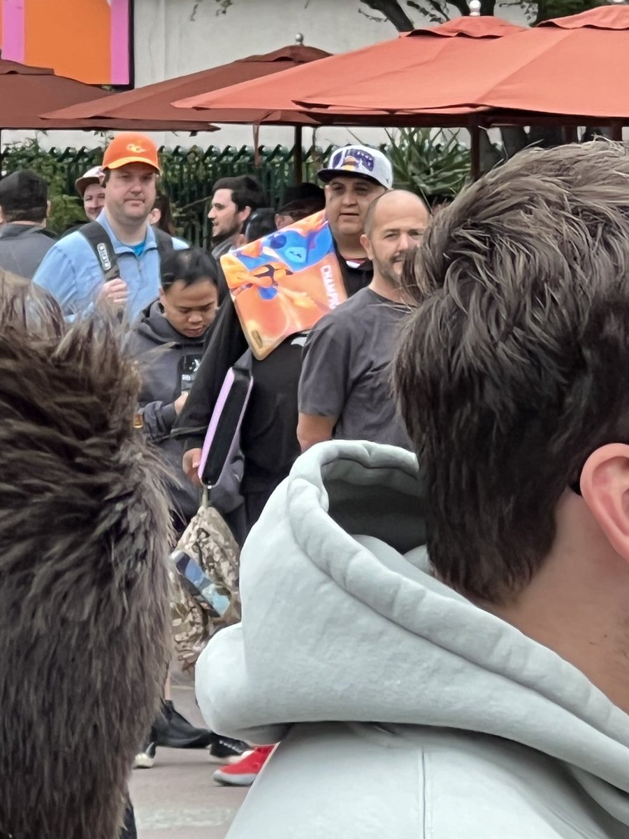 what are the odds the guy walking around downtown Disney with the champion mat on his shoulder actually won it