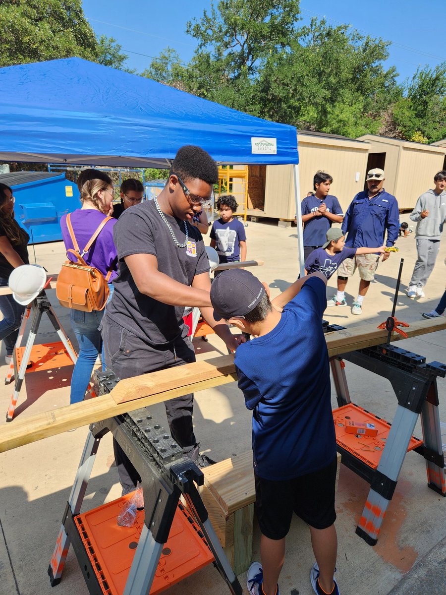 Preston volunteering at CCA Tiny Home Showcase