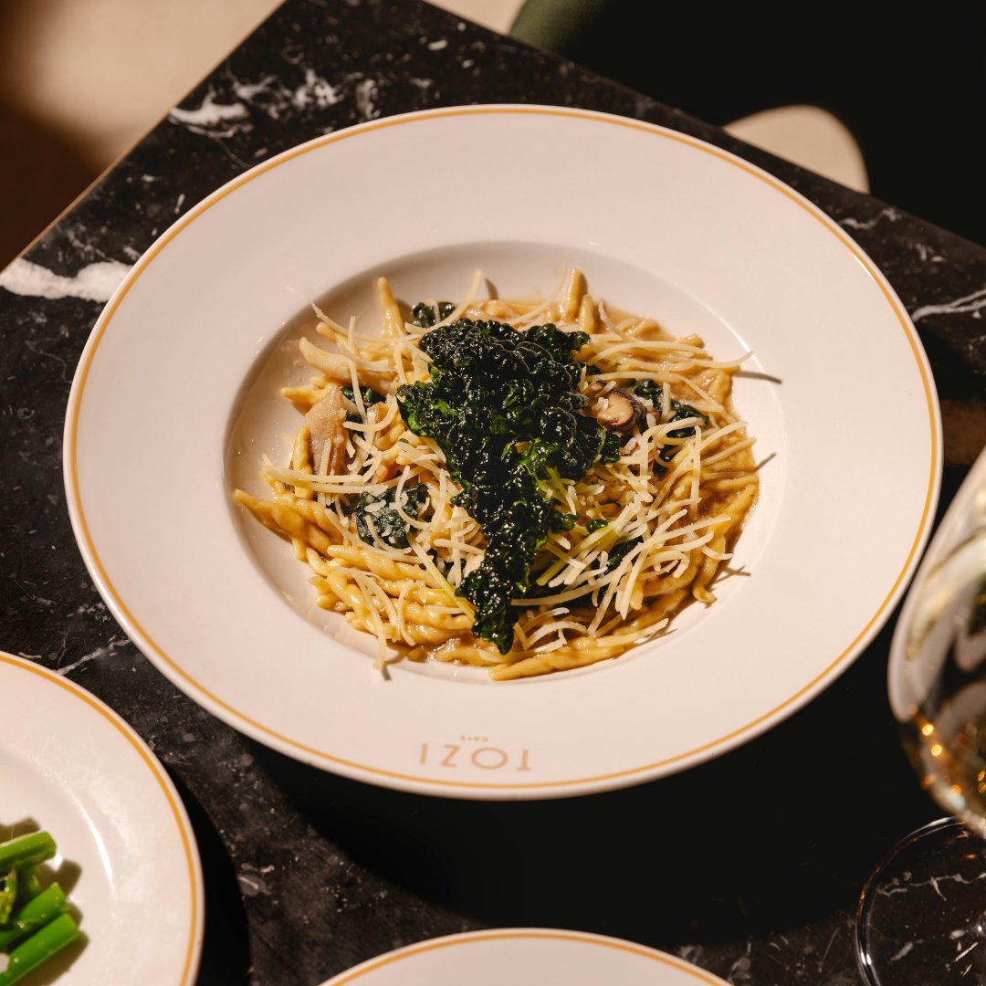 #NationalVegetarianWeek is here! Time to shake up your usual order and discover something new.

Join us at TOZI Battersea, where we're currently loving the Trofie with mushrooms and cavolo nero, topped with Parmigiano vegano.🌱