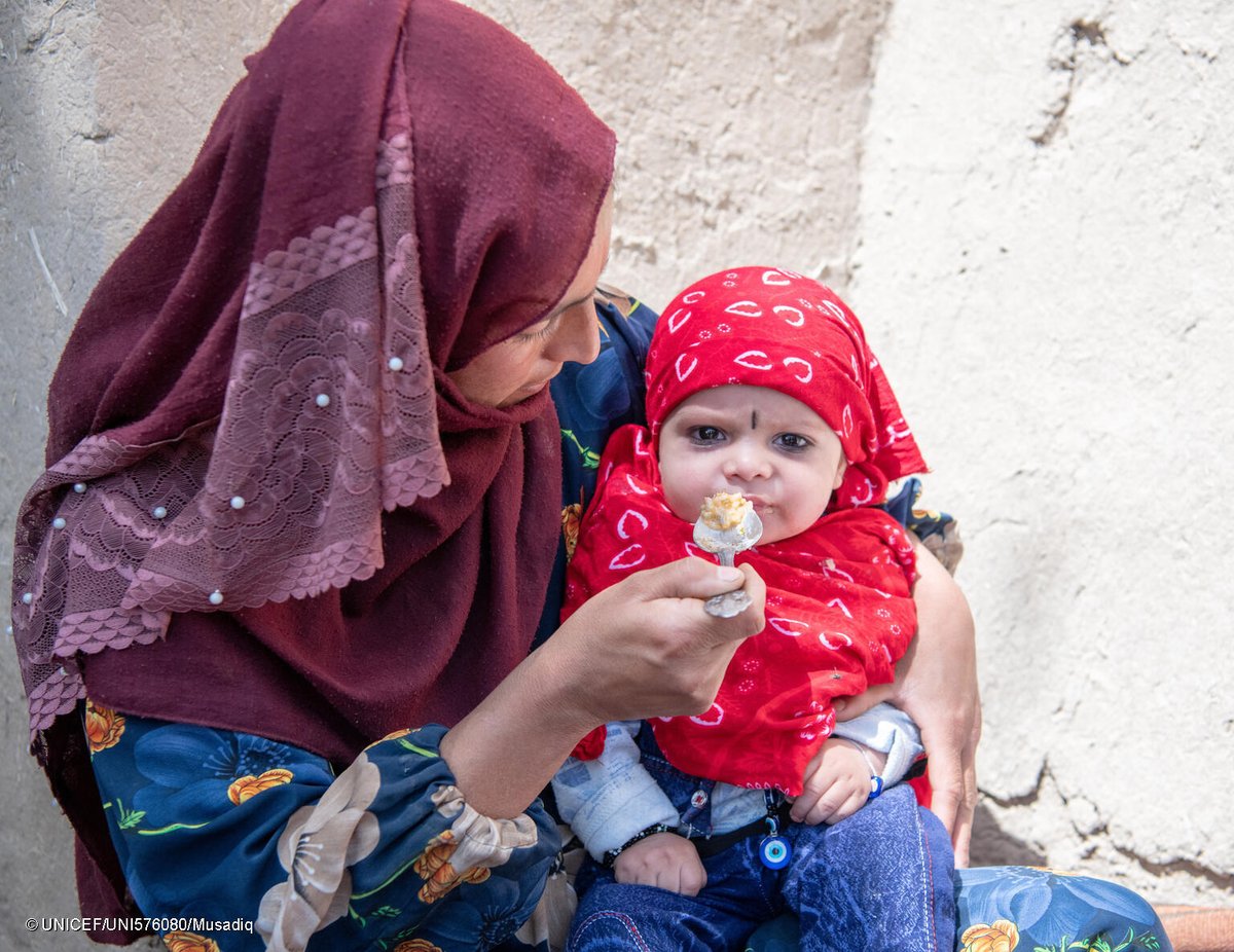 When a weighing scale doubles as a fun swing! Gul Jan has taken her baby Ahmad-Sudais for a nutrition screening at a UNICEF-supported health post in Sar-e Pol province, Afghanistan. #ForEveryChild, nutrition.