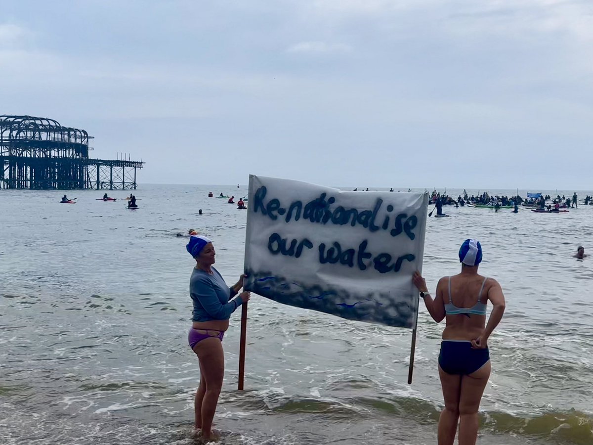 MASSIVE paddle-out protest with @sascampaigns this morning on Brighton beach. Loved that Dame Kelly Holmes joined us! 💩No more sewage in our seas and rivers. 🧻 Wipe away privatised water!