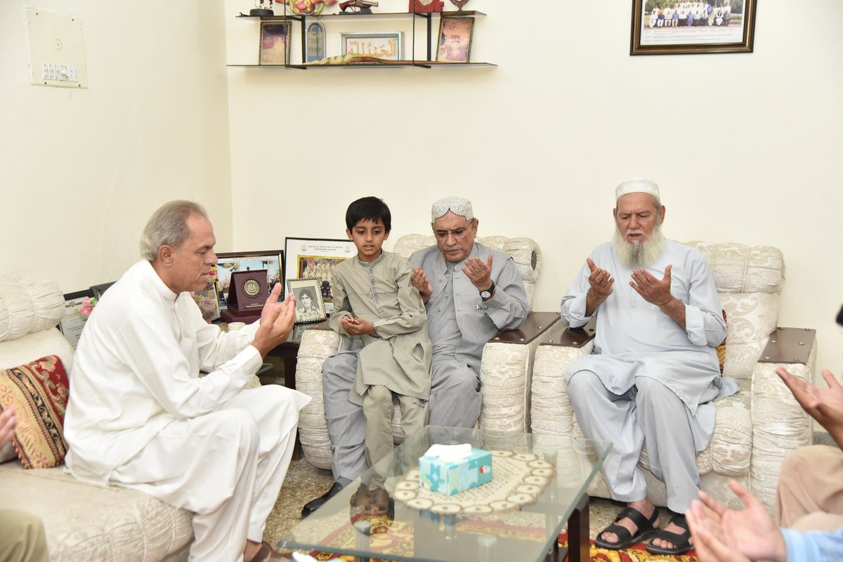 President @AAliZardari offering Fateha during his visit to the family home of Shaheed Major Babar Khan, in Mianwali