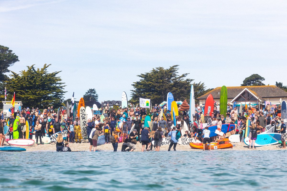 Message from Falmouth is clear - NO MORE SEWAGE IN OUR SEAS ❌💩 Hundreds paddled at Gylly beach to tell poo-lluters it's time to cut the crap. Proud to be part of such an epic community of #OceanActivists 🤙✊🌊 📷 1,3: PA media 2,4: Elliott Glynn