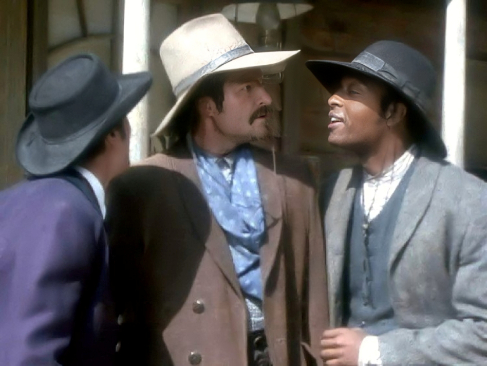 Ezra: Where you going, Buck? 'Nunca sounded an awful lot like tonight.'
Nathan: Let me translate for you, Buck.
Ezra and Nathan: Never!
Buck: Oh, hell, it wasn't that funny.

Episode: Love and Honor
#AnthonyStarke #DaleMidkiff #RickWorthy #Magnificent7TV