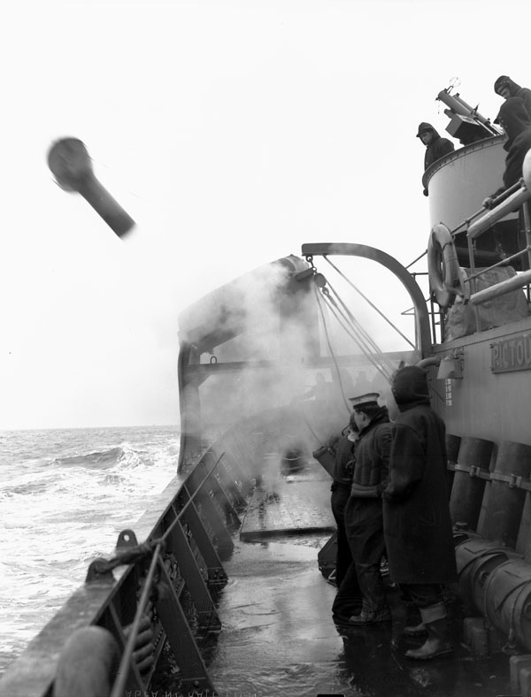 Firing of a depth charge from the corvette HMCS PICTOU at sea, March 1942. (LAC a116838-v6) #RCN #History