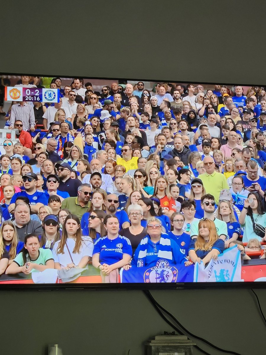Brilliant photo. Spot the united fan 😂😂 hint: she doesn't look happy! #WSL