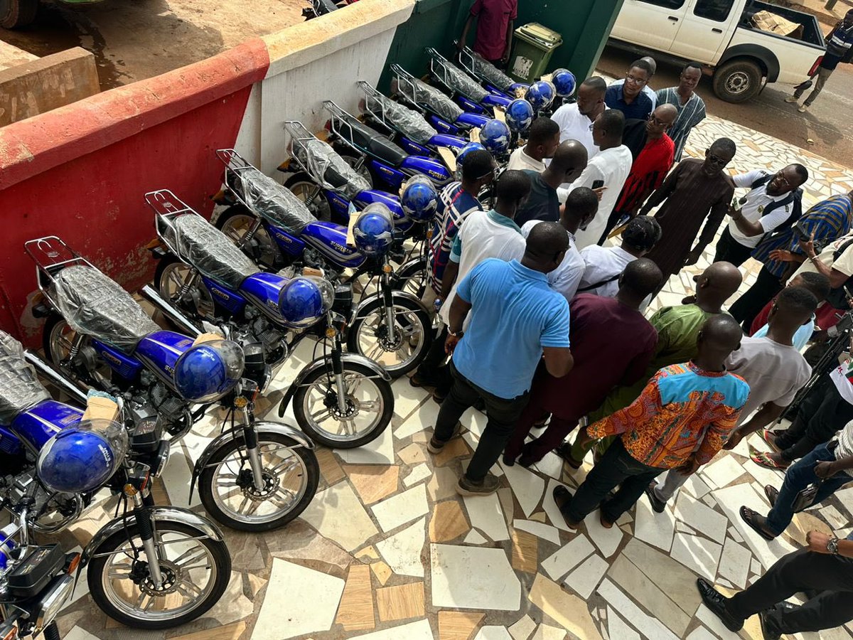 AnnanPerry's tweet photo. Earlier today, I presented eleven (11) motorcycles to our Bono East Regional Chairman for onward delivery to our hardworking Communication Officers in the region, for and on behalf of H.E. John Dramani Mahama.

We are eternally grateful to our father and flag-bearer H.E. John Dramani Mahama for his continuous support and guidance. 

So far, all our Communication Officers in seven (7) regions (Bono, Upper East, Upper West, North East, Western North, Savannah and Bono East) have received brand new motorbikes to enhance their mobility and assist them to effectively disseminate the messages of the party. Some of these regions and others have also received logistics such as mobile phones, laptops among others in this endeavor. 

Our profound appreciation also goes to all our benefactors who continue to support the communications bureau of the party. With your support and the help of God, we shall cover all 16 regions and achieve our goal of providing every region with a strong pickup vehicle mounted with strong P.A system, for the effective dissemination of the messages of the party for VICTORY come December 7, 2024. 

SAMMY GYAMFI ESQ.
National Communications Officer, NDC