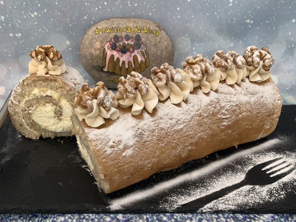#SwissRoll flavoured with a hint of coffee and filled with fresh cream ‘coffee n cream’ topped with a little coffee flavoured buttercream and walnut half. #TwitterBakeAlong #FirstTMaster