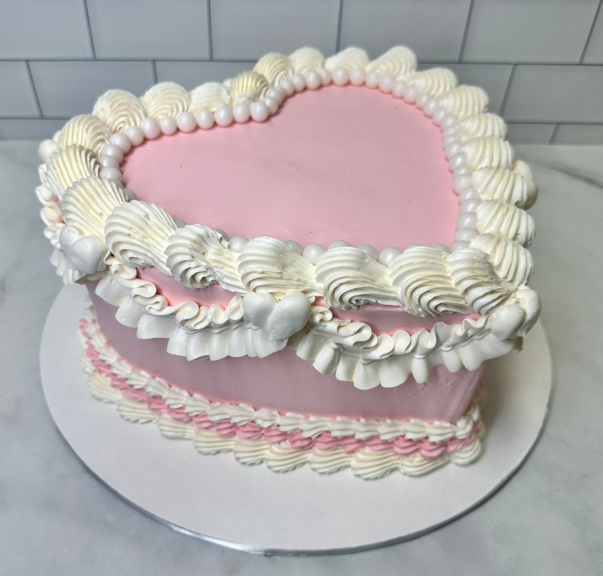 Our lambeth piping heart cake. Beautiful and customizable 😍

#lambethcake #kupcakekitchen #wantcake #heartcake #heartcakes #heartshapedcake  #lambethcakes #cakeforlove #cakeart #birthdaycakeideas #cakeinspo #designercakes #customcakes #beautifulcakes #amazingcakes #santaclarita