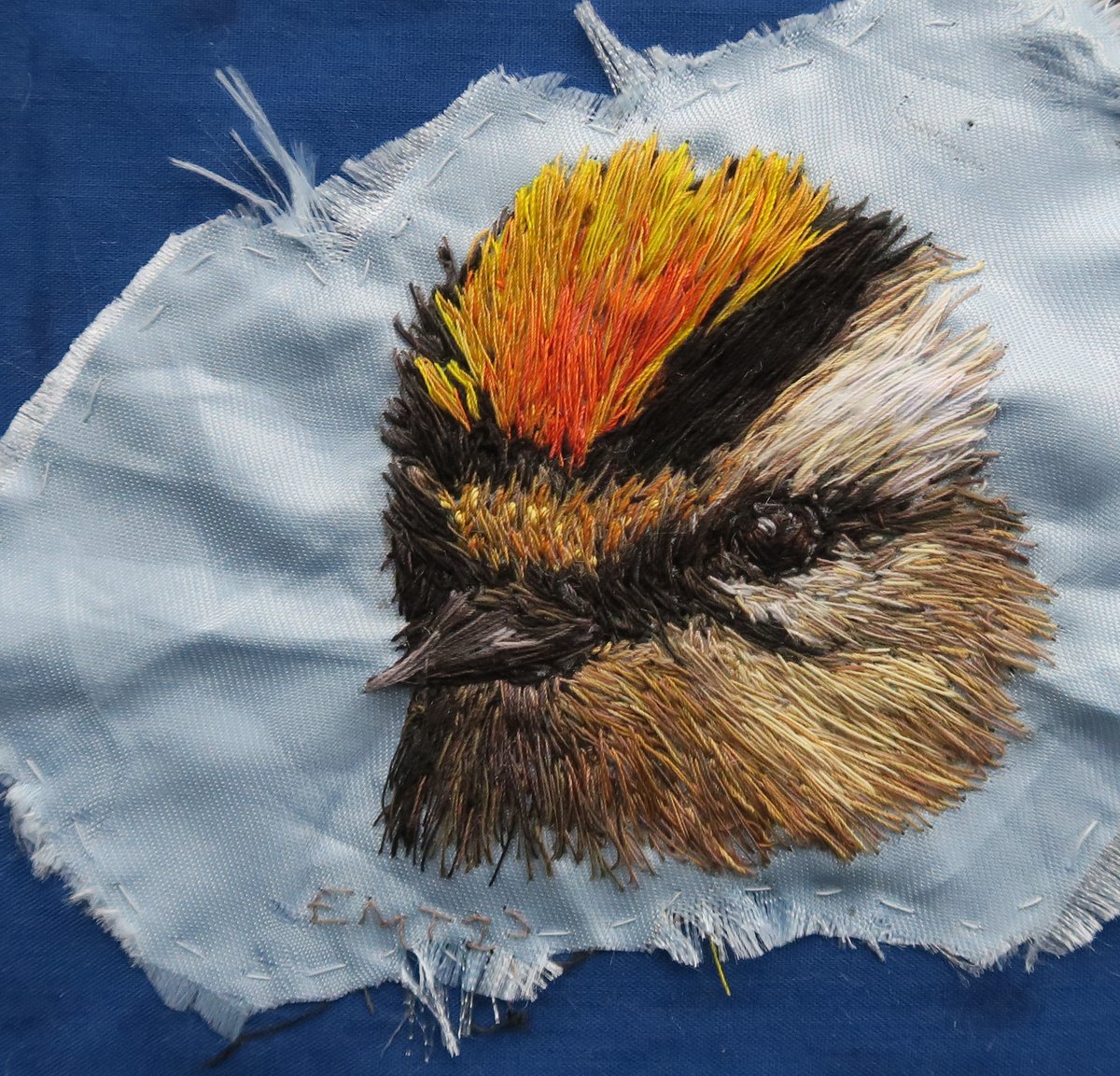 Firecrest bird thread painting artwork, created with hand embroidery. Set in a black frame. emilytull.co.uk/store/p208/fir… #ShopIndie #HandmadeHour