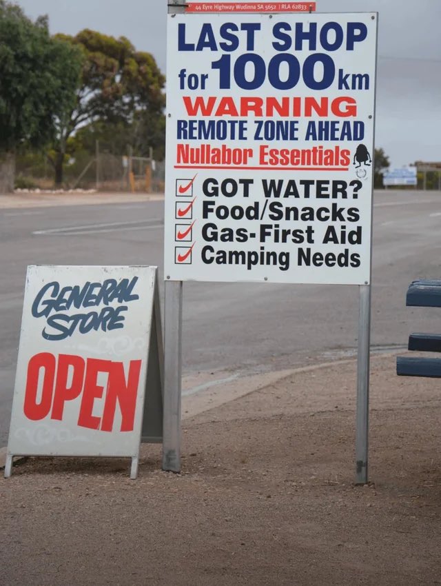a sign in australia before the sparsely populated outback