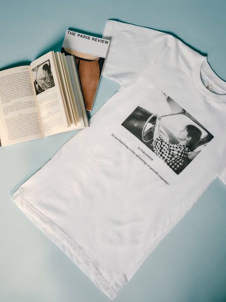 Our new interview tee series features iconic photographs of writers, provocative questions, and the Review’s instantly recognizable typography. Shop our Helen Garner edition now. buff.ly/3QBuBn2