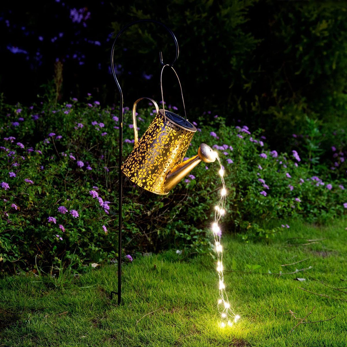 Illuminate your outdoor garden path with our hanging lanterns from sunlitbackyardoasis.com! Create a cozy and inviting atmosphere with these beautiful lights. #outdoorlighting #gardenpath #hanginglanterns.
