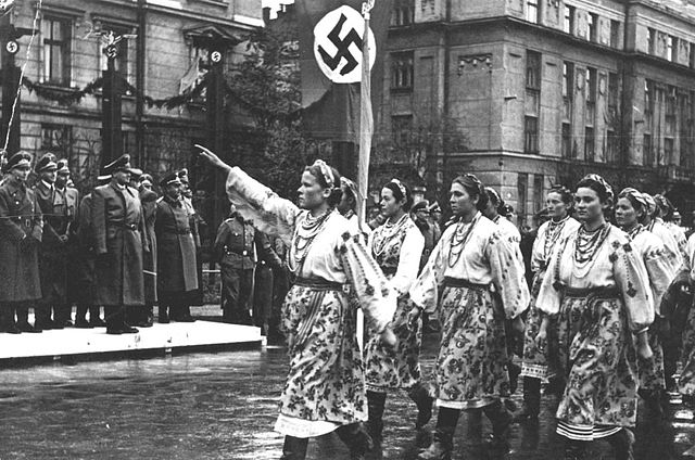 Gals in national dress salute the Nazi high command in western Ukraine, welcoming them as liberators.

Instead of being morally repelled by the Nazis, the OUN went woo-hoo, now we can slaughter Poles and Jews with impunity.

Even after the terms 'Lebensraum' and 'Arisierung'