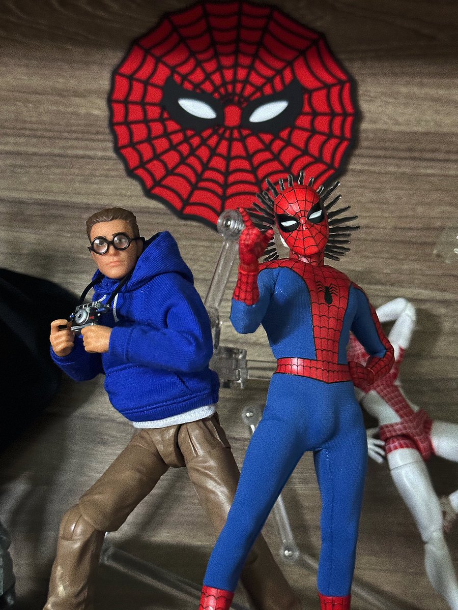 Just made a custom Peter Parker figure for fun and he looks great with my Mezco Spidey! Real Ditko vibe!