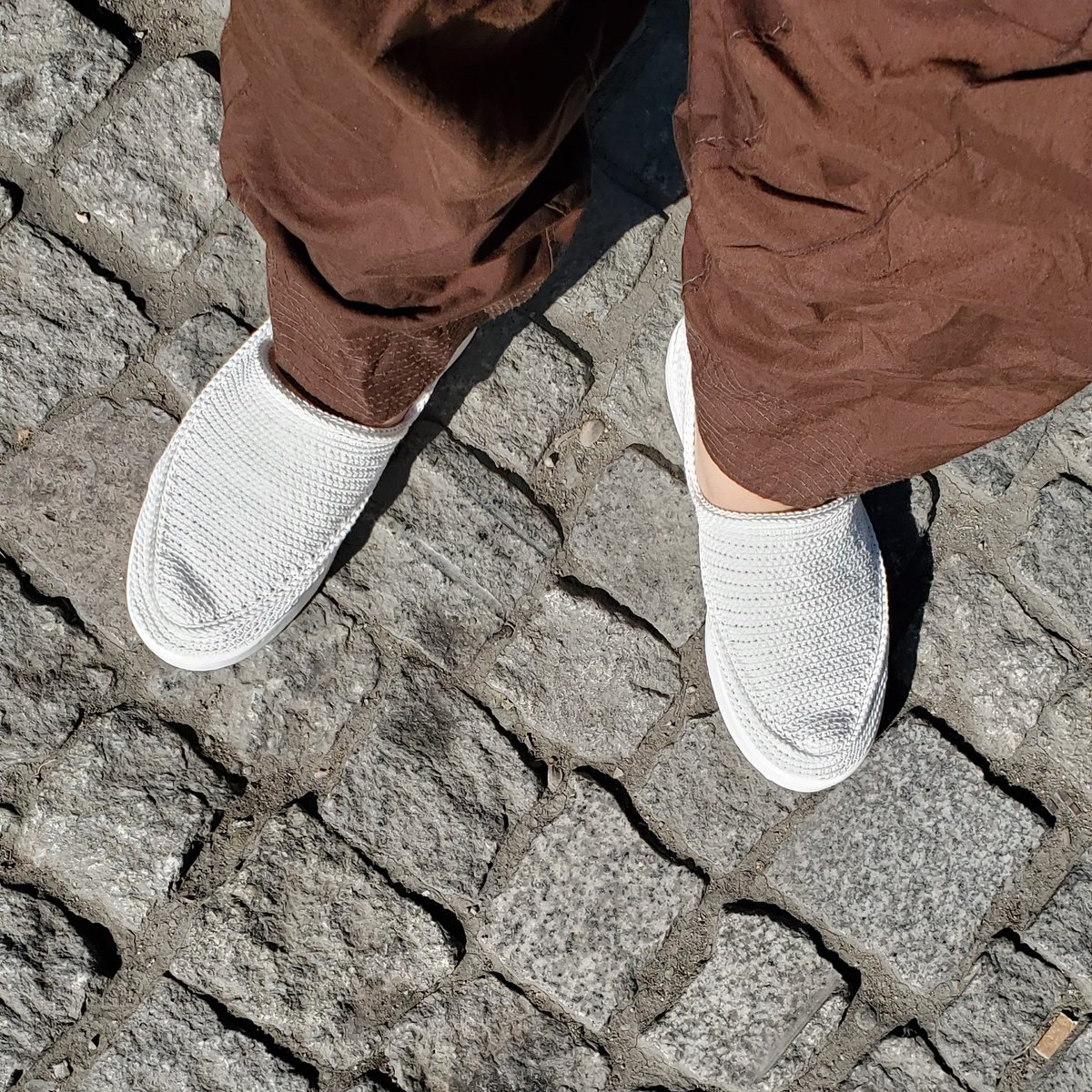 'Gīve' are traditional hand-woven Iranian summer shoes. The traditional style, with a soft sole, is not suitable for modern cities, so they have begun selling them with contemporary rubber soles.