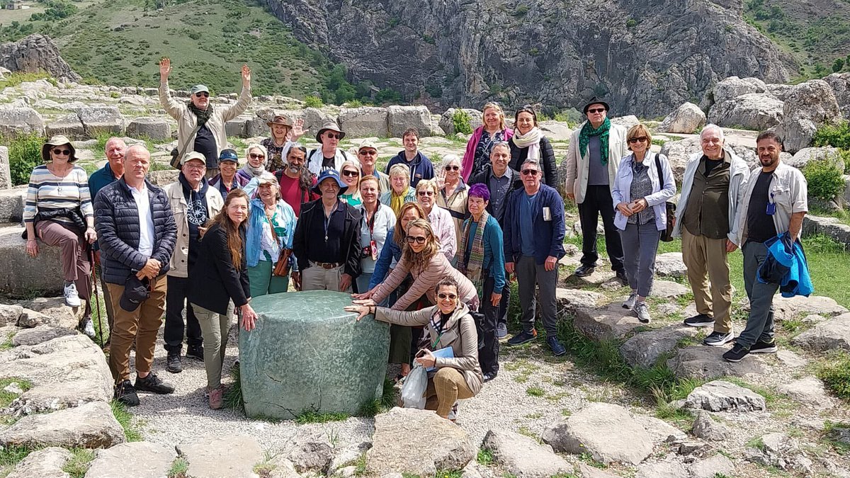 Our group at Hattuşan around the magical green stone .